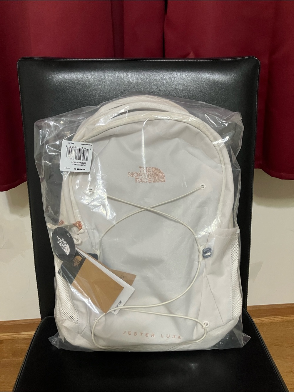 The North Face Women’s Jester Luxe Backpack Gardenia White/Burnt Coral Metallic